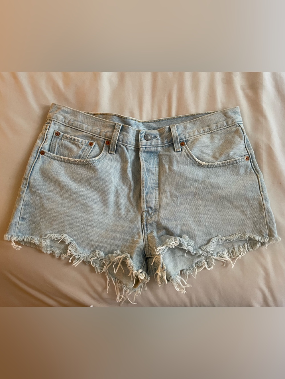Vintage Levi’s Light Blue Distressed Denim Shorts